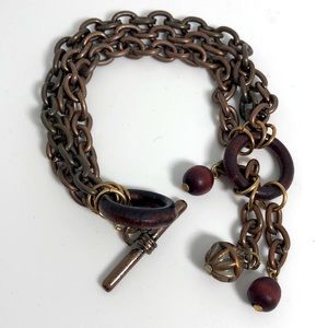 Bronze triple chain bracelet wooden details
